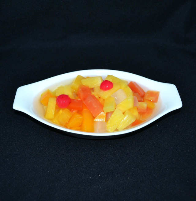 Fruit cocktail, tropical, in syrup, cnd