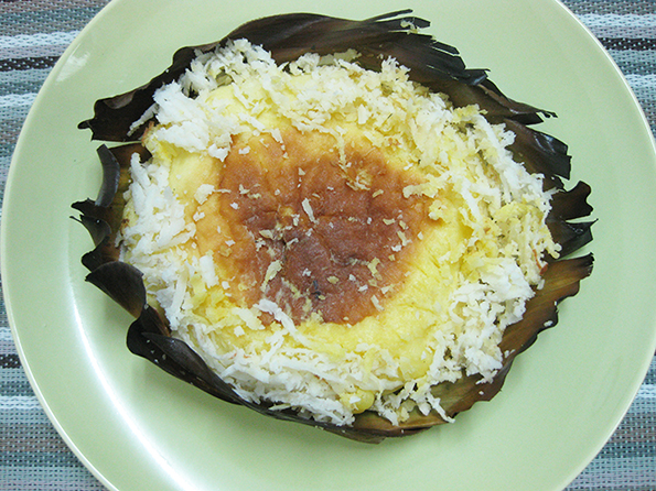 Rice cake, bibingka, w/ cheese & coconut topping